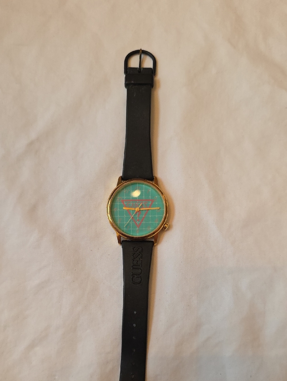 GUESS Vintage Gold-Case Watch with Black Rubber Strap & Teal Geometric Dial